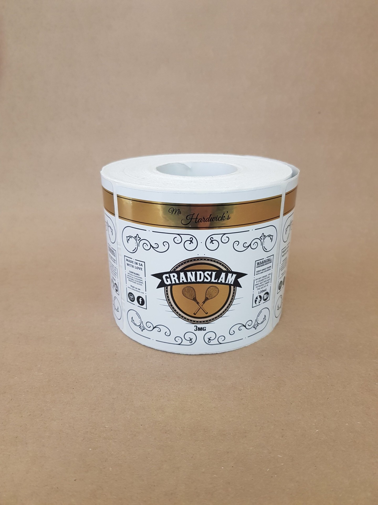 Mr Hardwick's Grandslam vape label roll with gold foil banner and vintage tennis crest Mr Hardwick's Grandslam vape label roll with gold foil banner and vintage tennis crest