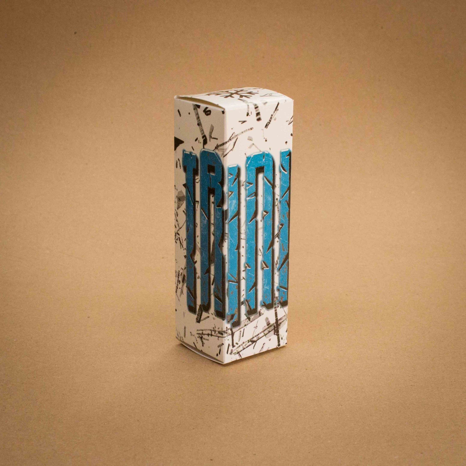 TRON vape juice folding carton with shattered ice graphic and blue letterpress typography TRON vape juice folding carton with shattered ice graphic and blue letterpress typography