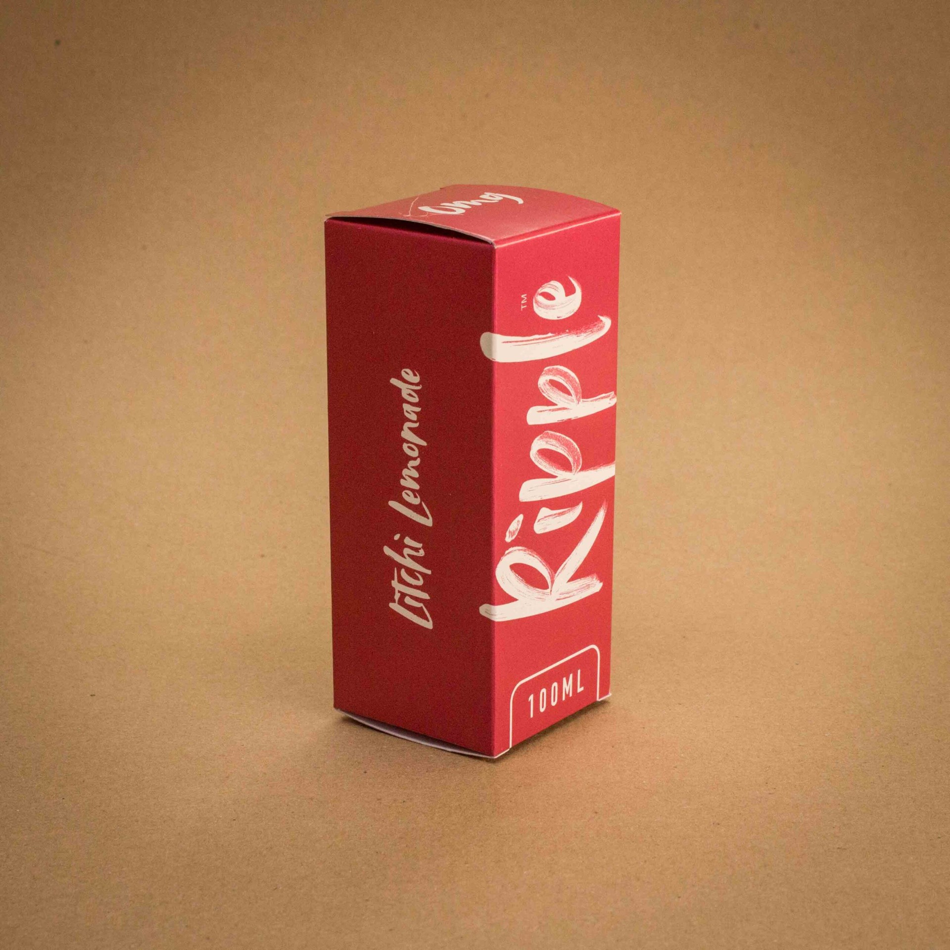 Ripple Litchi Lemonade 100ml folding carton with hand-lettered white script on red Ripple Litchi Lemonade 100ml folding carton with hand-lettered white script on red